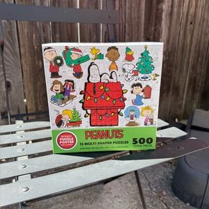 Charles Schulz Peanuts 12 Multi Shaped Puzzles 500 Pieces New in Box Holiday Set